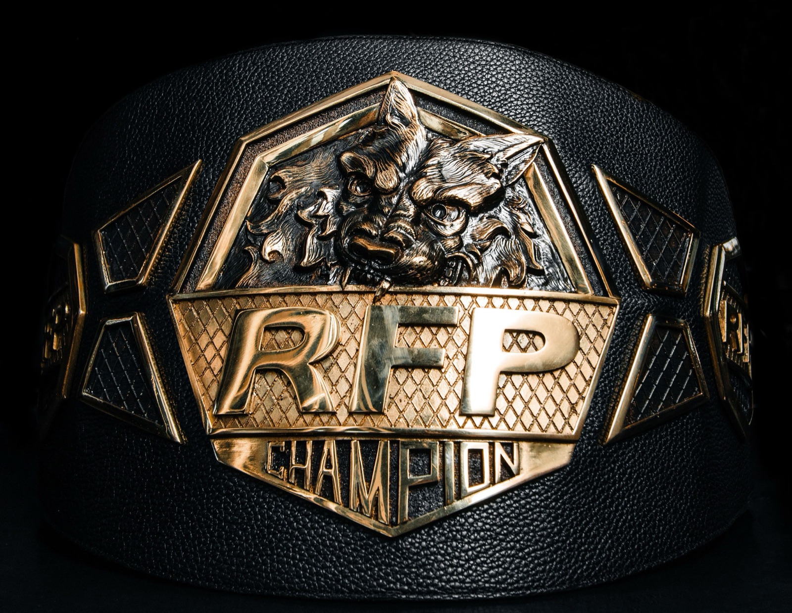 A close view of an RFP championship belt.